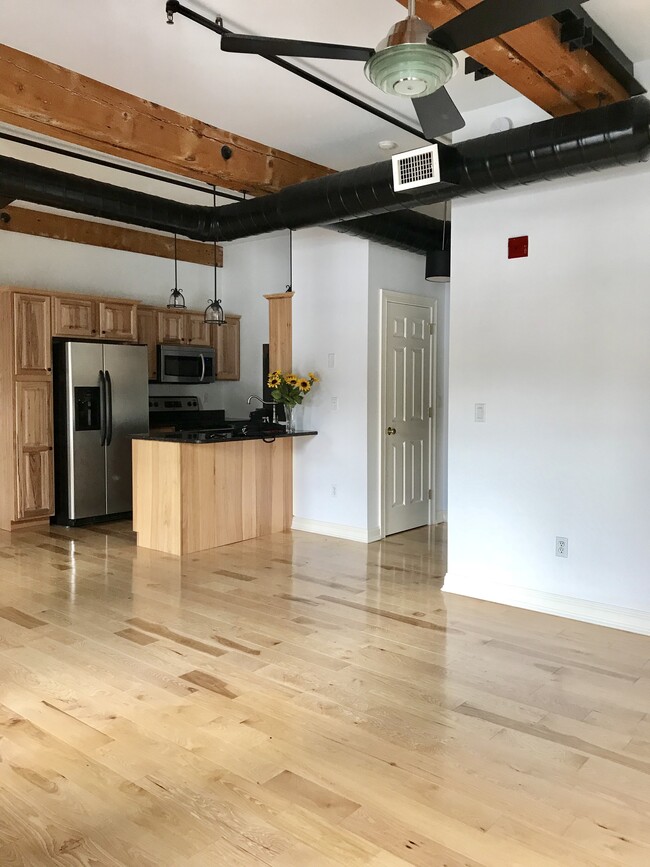 Living room / into kitchen - 6 Bay Rd