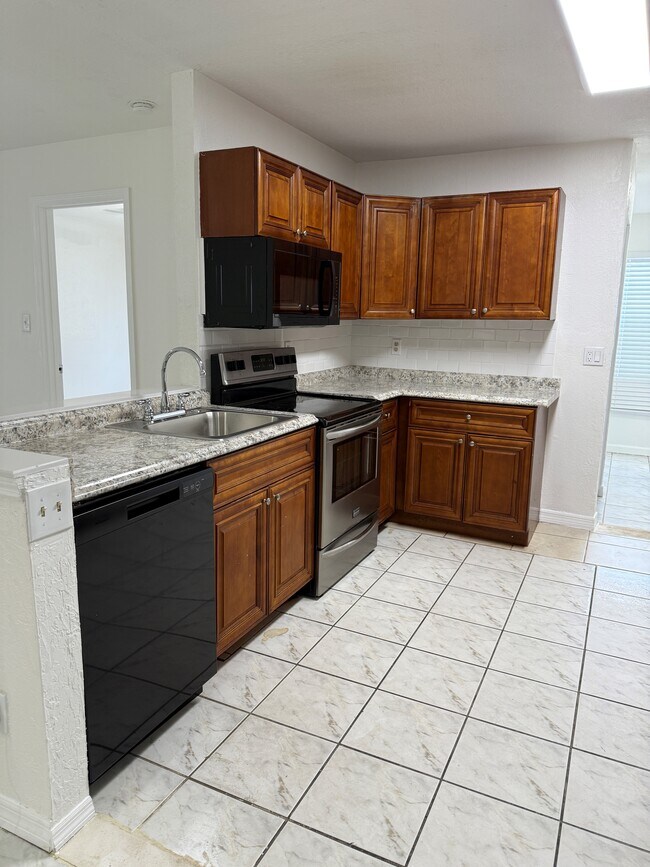 Foto del edificio - 1131 W 26th St