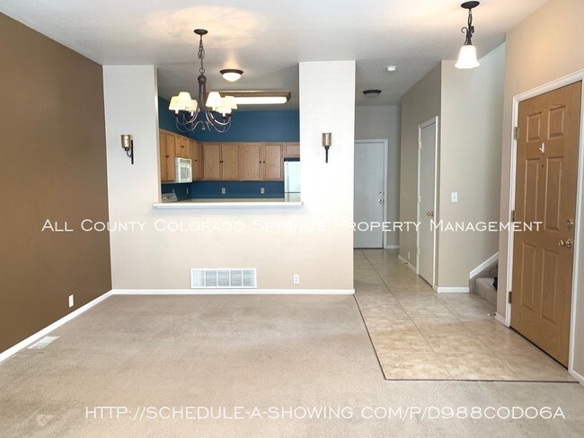 Building Photo - 5946 Ensemble Heights