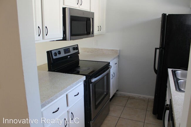 Foto del edificio - 2 br, 1.5 bath House - 5867 Curry Ford Rd. #9