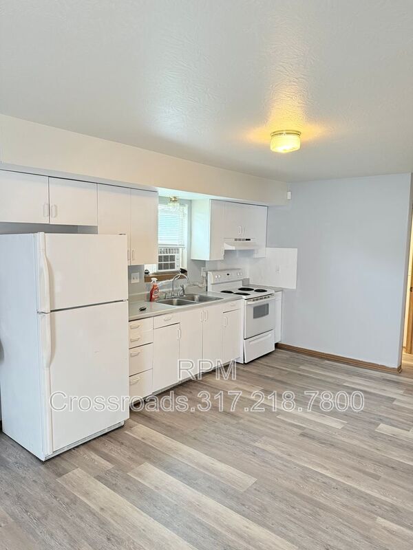 Foto del edificio - 6259 E 11th St