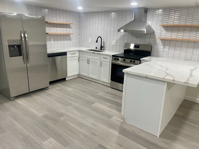 New kitchen/appliances. Washer/dryer in unit. - 846 42nd St