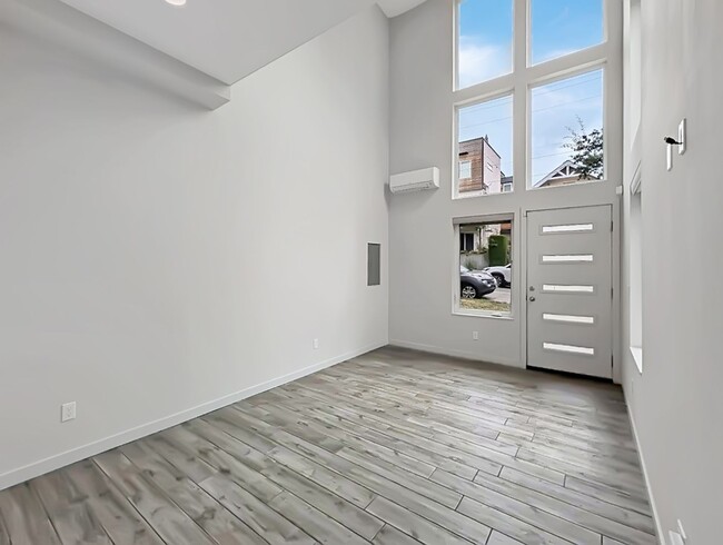 Building Photo - Stunning Two-Bedroom Townhome with Rooftop...