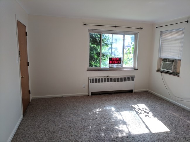 Main/front room looking to the front window - 716 S Ft Thomas Ave