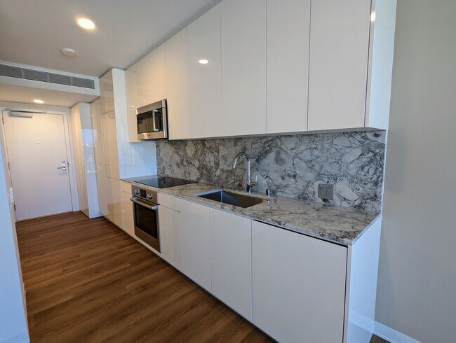 Foto del edificio - New Fully Furnished High Floor luxurious S...