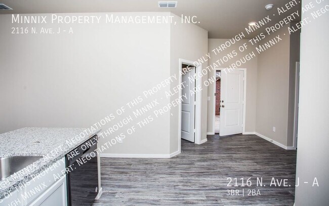 Building Photo - 2116 N. Ave J #A
