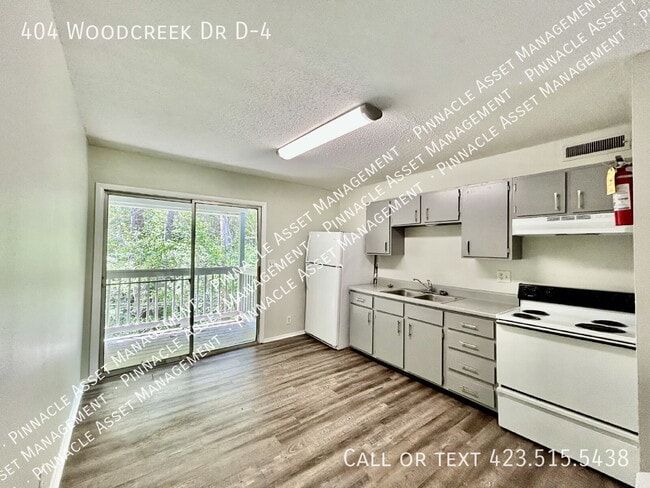 Photo - 404 Woodcreek Dr D-4- Apartment