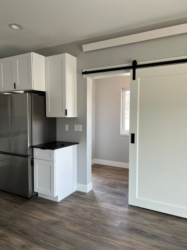 Building Photo - Cute, Cozy and Brand New