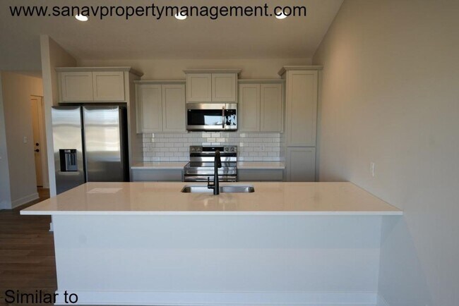 Building Photo - "Modern Comfort: Brand New Ranch-Style Liv...