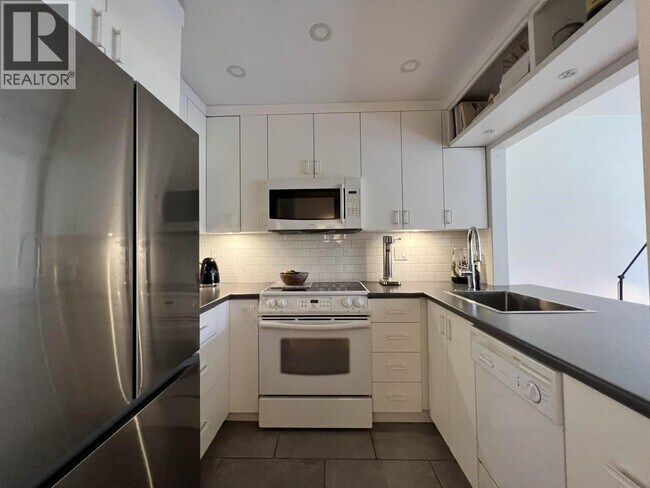 Photo du bâtiment - 3875 W 4th Ave