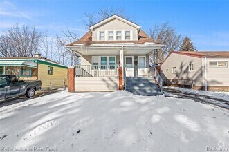 Building Photo - 7559 Studebaker Ave