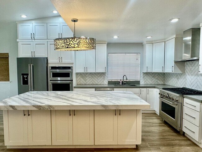 Building Photo - One story gorgeous home in the highly desi...