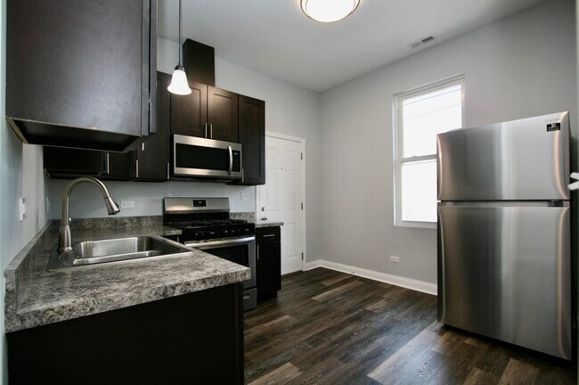 Building Photo - 6631 S Rhodes Ave