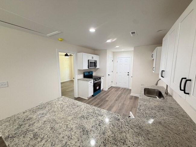 Building Photo - New Construction 2026 2bd/2ba Triplex in convenient location.