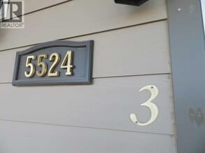 Building Photo - 5524-5549 49 Ave