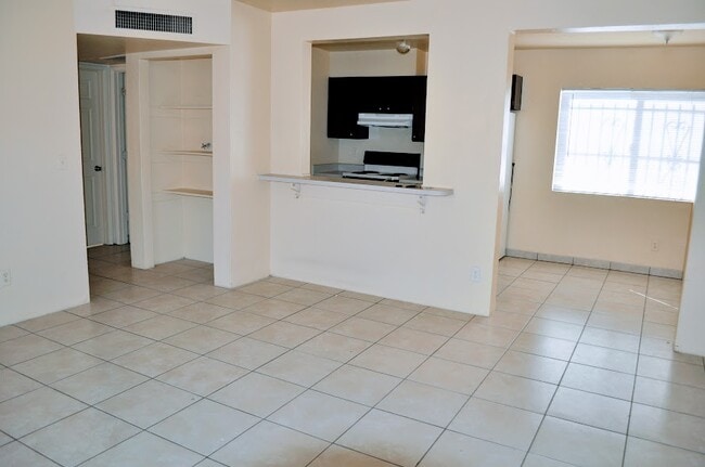 Breakfast counter white cabinets dining area - 2431 N Fontana Ave