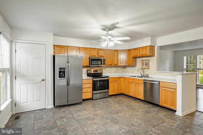 Photo - 596 Coach Hill Ct Townhome