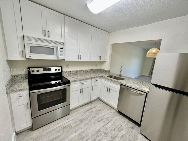 Building Photo - 7700 Camino Real