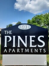 Building Photo - Pines Apartments