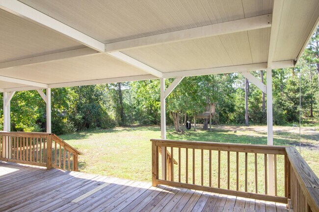 Building Photo - 9289 E River Dr