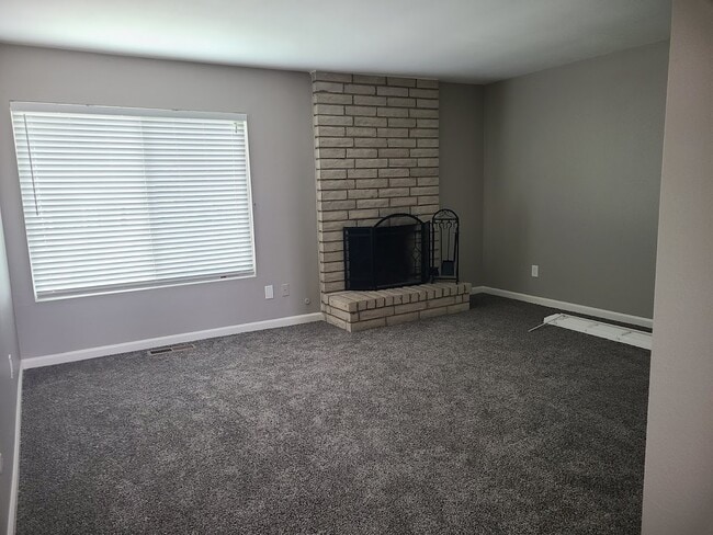 Living room and fireplace - 3086 Vesuvia Way