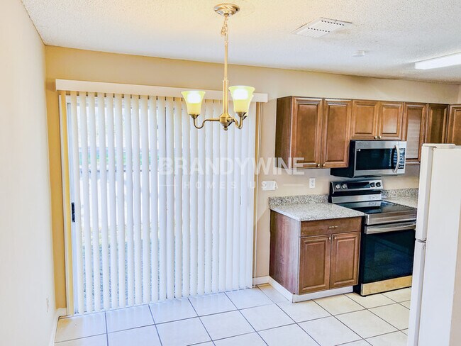 Building Photo - Discover Your Happy Place! Book a Tour & A...