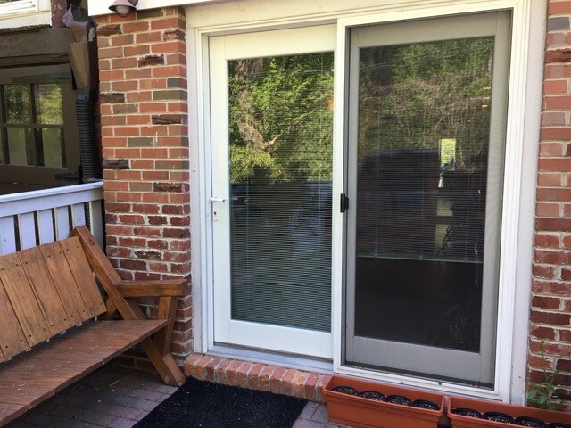 Outdoor space and entrance to apt overlooks woodland - 1553 44th St NW