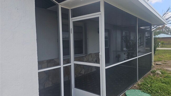 Building Photo - 7503 Sanibel Blvd