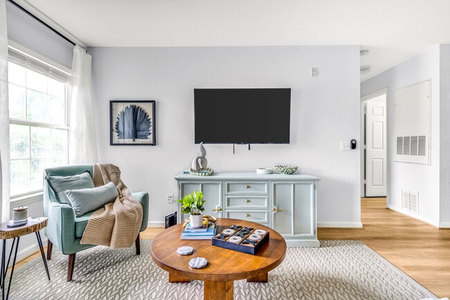 Warm and inviting living area perfect for hosting guests - 4850 51st St W Apartment