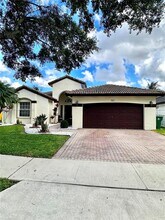 Building Photo - 3501 SW 142nd Ave