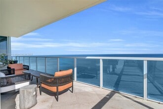 Building Photo - 16699 Collins Ave
