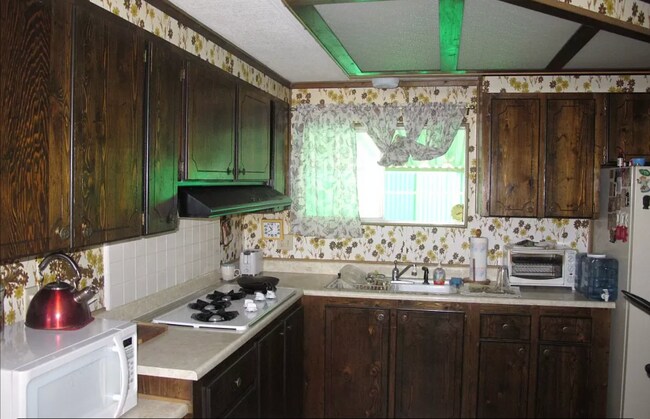 Building Photo - 26108 Fountain Palm Drive