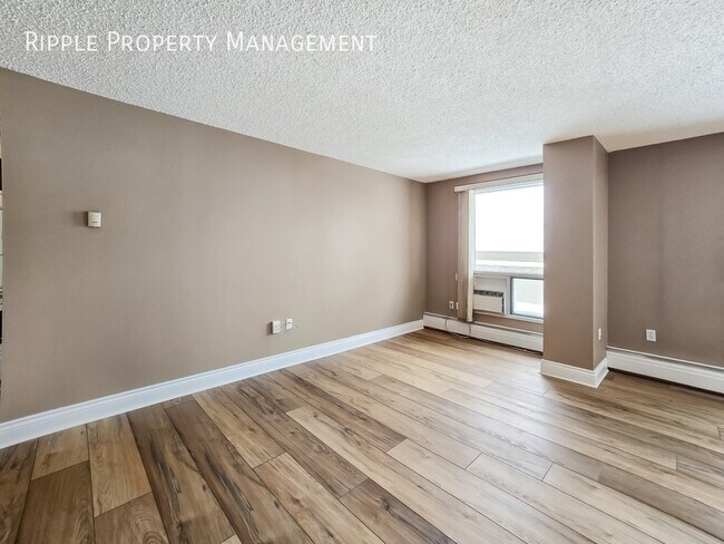 Photo du bâtiment - SPACIOUS 1 BED + DEN, 1 BATH CONDO | STUNNING CITY VIEWS | BELTLINE