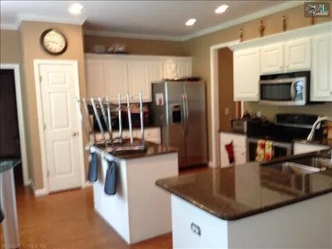 Building Photo - 6615 Windwan Dr