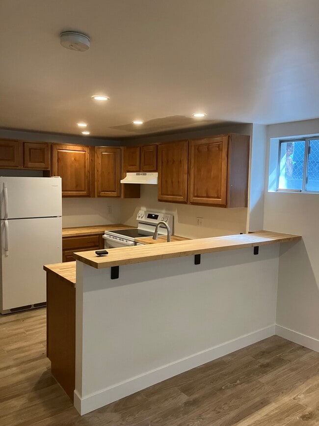Open Area Kitchen Bar Area with Butcher Block Counter - 1109 1st Ave N