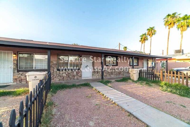 Building Photo - 5460 W Palmaire Ave