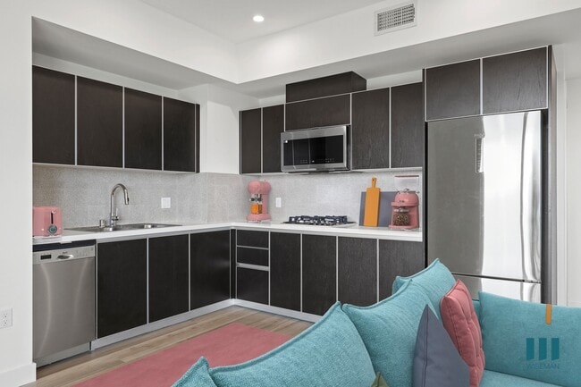 Open-Concept Kitchen with Stainless-Steel Appliances - Sherman Floor Plan - Ogden Garden by Wiseman