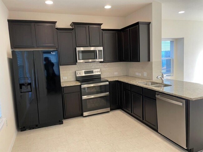 Foto del edificio - 9610 Morning Iris Dr