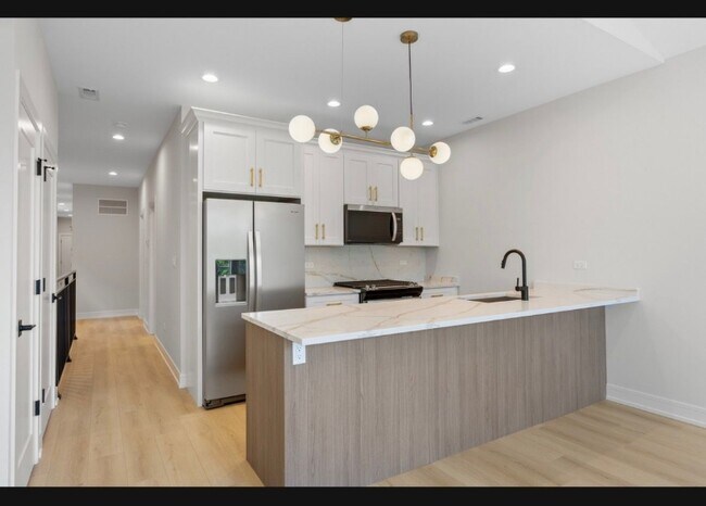 Foto del edificio - 5006 S Prairie Ave