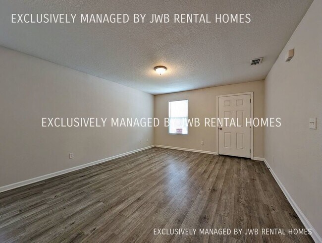 Building Photo - 6133 Strawflower Pl