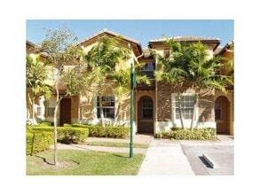 Building Photo - 3390 NE 13th Cir Dr