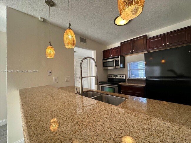 Building Photo - 8610 N Sherman Cir