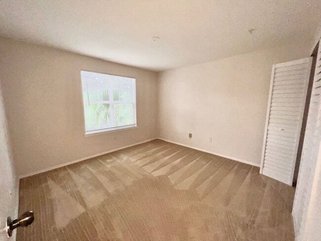 Photo - Move in NOW- Spacious 2 bedroom 1 bath condo on 3rd floor in gated community! Water included with...