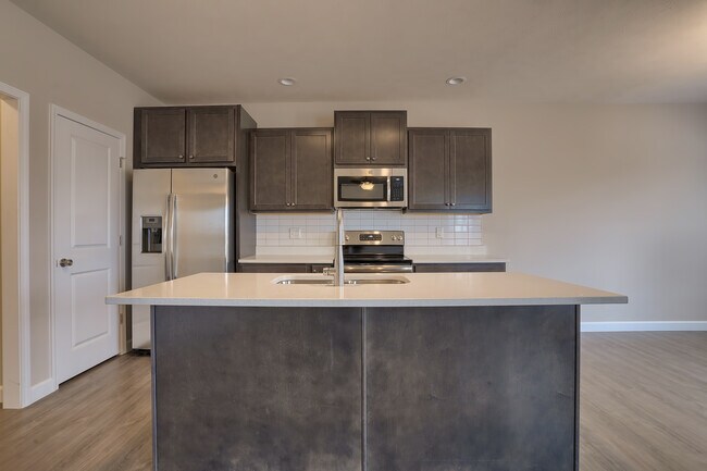 Building Photo - Summer Sage Condos