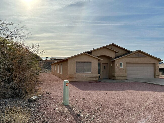 Building Photo - Long term - Unfurnished - Large home with ...