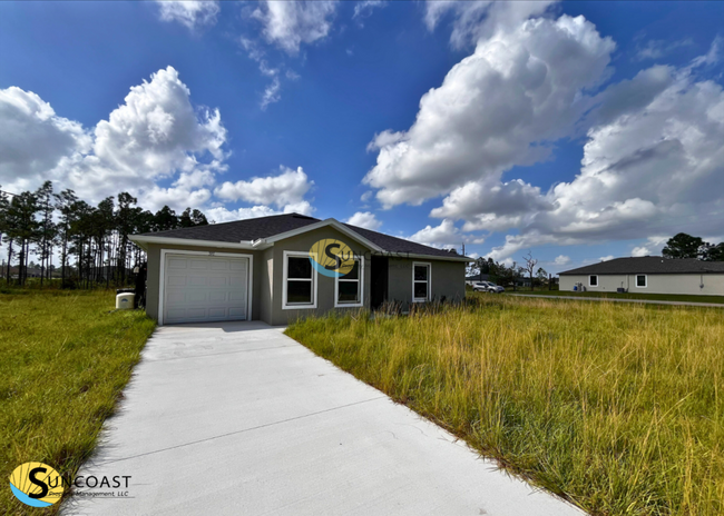 Foto del edificio - Move-In Ready Duplex in Lehigh Acres: Spac...