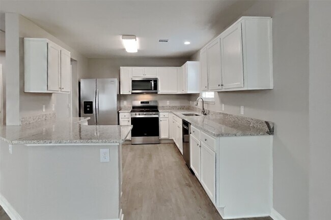 Foto del edificio - 6423 Lily Hollow Ct