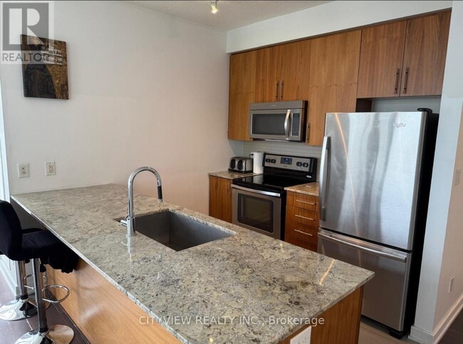 Photo du bâtiment - 4099-4099 Brickstone Mews