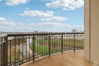Private balcony with sweeping city and field views - The Easton Downers Grove