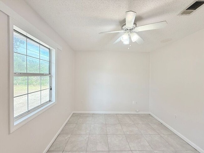 Building Photo - 4716 W Spencer Field Rd